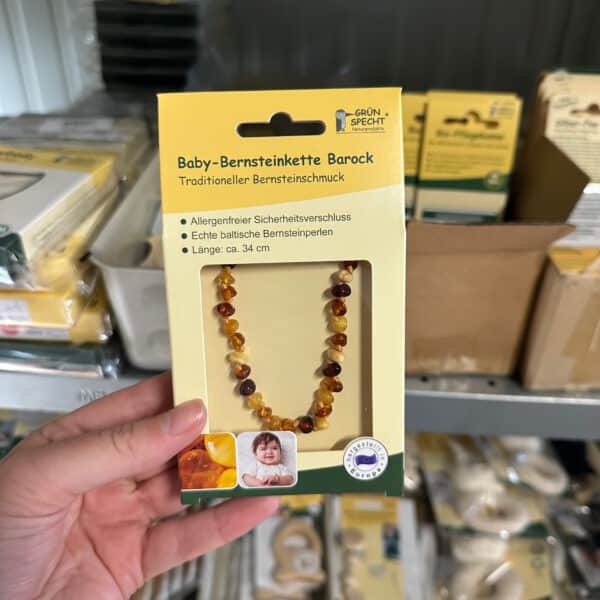 Grünspecht barnsteen babyketting multicolor – ronde barnsteenkralen, natuurlijk en stijlvol sieraad voor baby’s.
