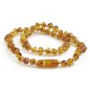 Grunspecht barnsteen ketting voor baby met cognac kleurige ronde kralen.