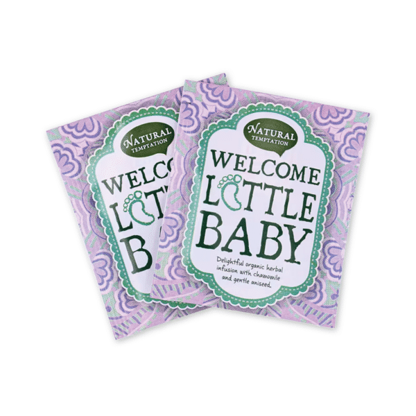 Verpakking van Natural Temptation Welcome Little Baby thee, een biologische kruidenmelange speciaal ontworpen als kraamcadeau, met een schattig en vrolijk design.
