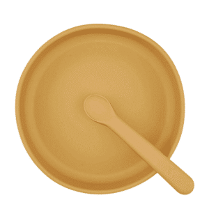 Okergeel bordje met lepel van siliconen.