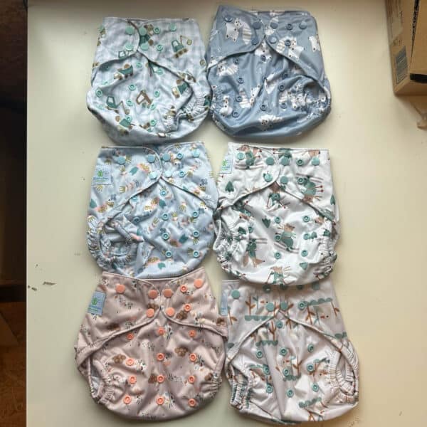 Blümchen wasbaar overbroekje met drukknopen van gerecycled polyester voor kinderen van 3 tot 15 kg