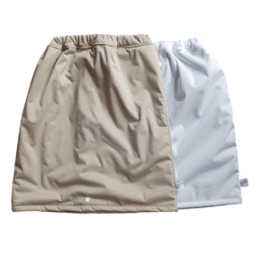 Waterdichte en absorberende rok voor de nacht.