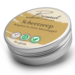 Blikje met handgemaakte scheerzeep van Biowust, geur sinaasappel bergamot.