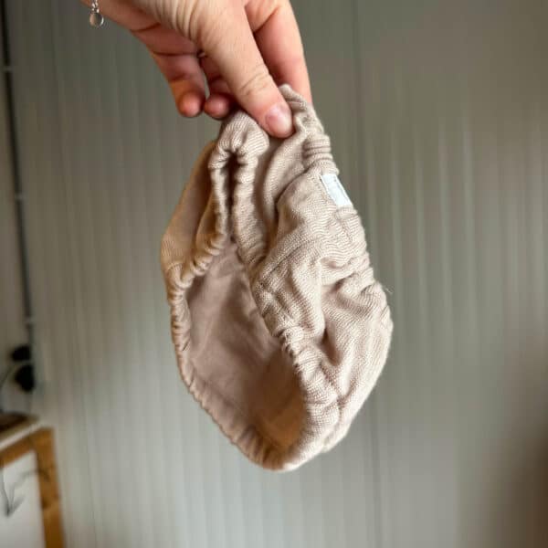 Merinowollen cover voor baby plaspotje van Kindsgut